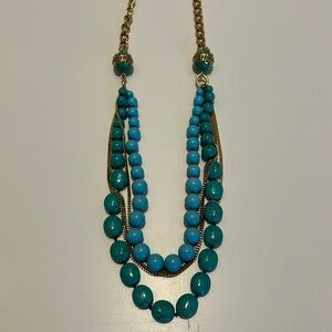 Carolee Lux, multi strand, long beaded necklace with pave setting.